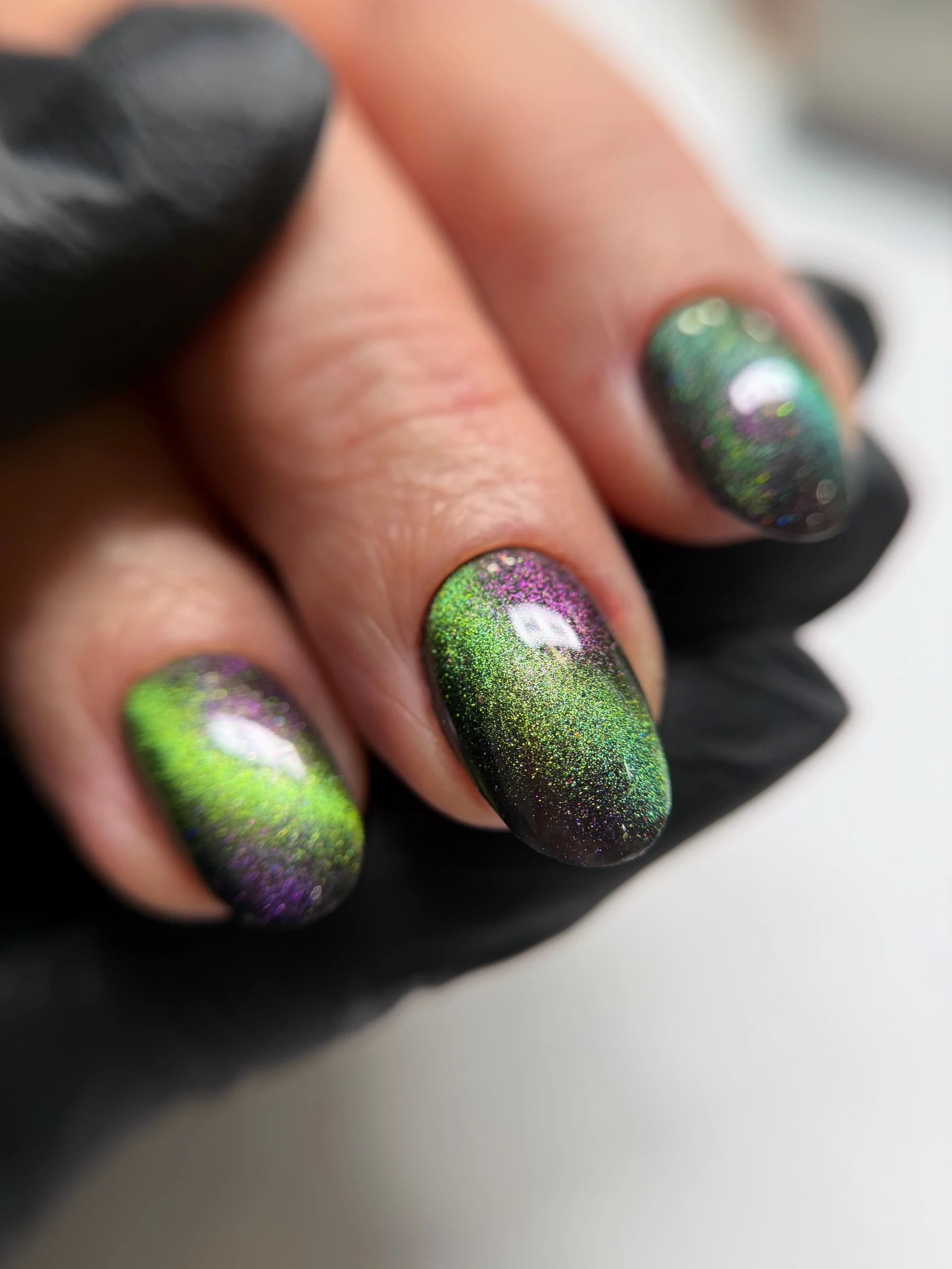 Effet œil de chat vert et violet